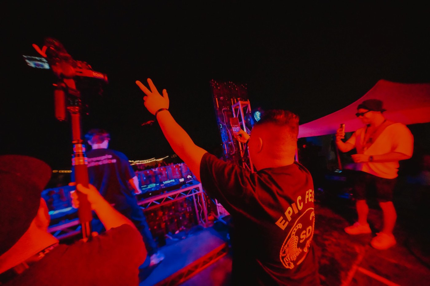 DJ playing to the crowd at night