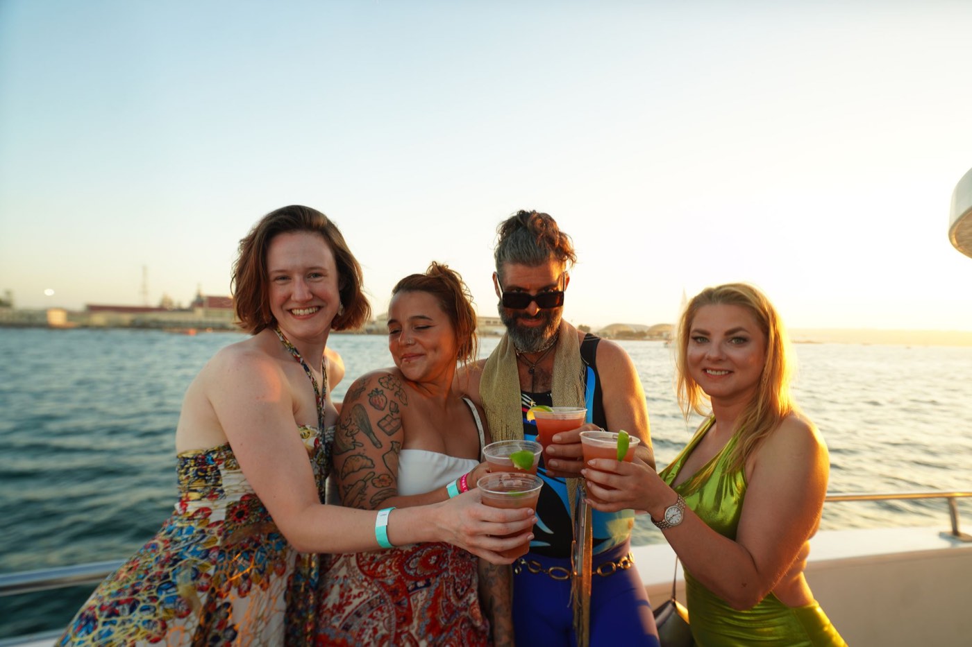 Boat party crowd at sunset